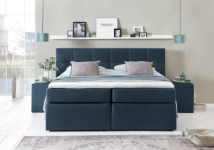 Boxspringbett Bea in blau midnightblue mit quadratischer Steppung und Visco Topper im Schlafzimmer